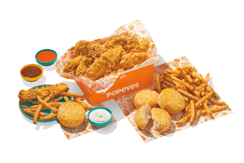 "Popeyes 8Pc Tenders Family Meal with fries, biscuits, and dipping sauces."