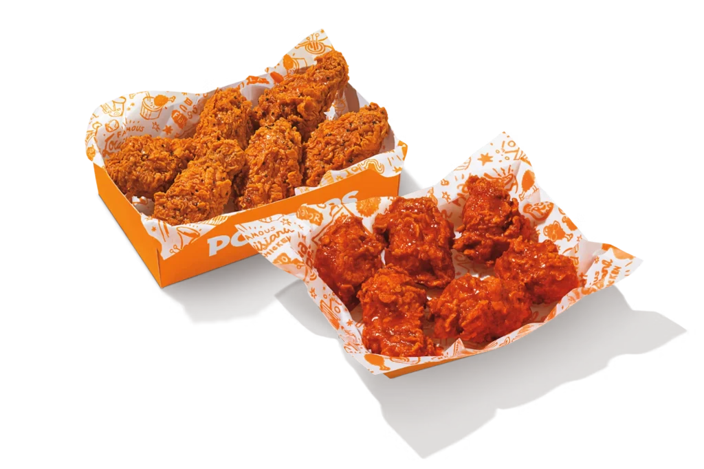 "Mix 'N Match Wings featuring classic and spicy varieties in Popeyes branded packaging."