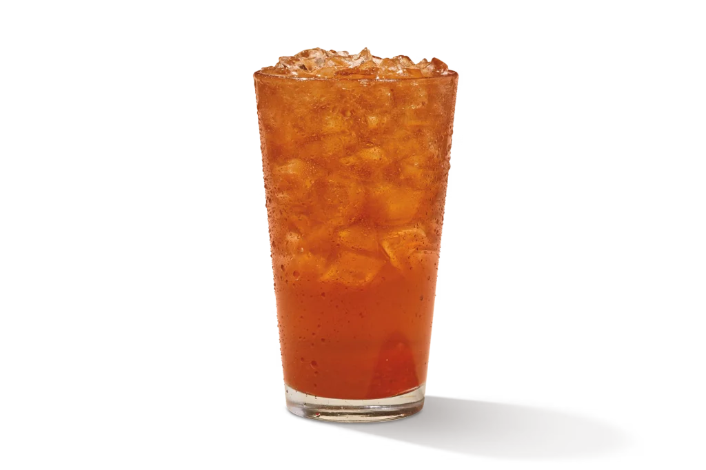 "Glass of Strawberry Unsweet Tea with ice cubes, on a white background."