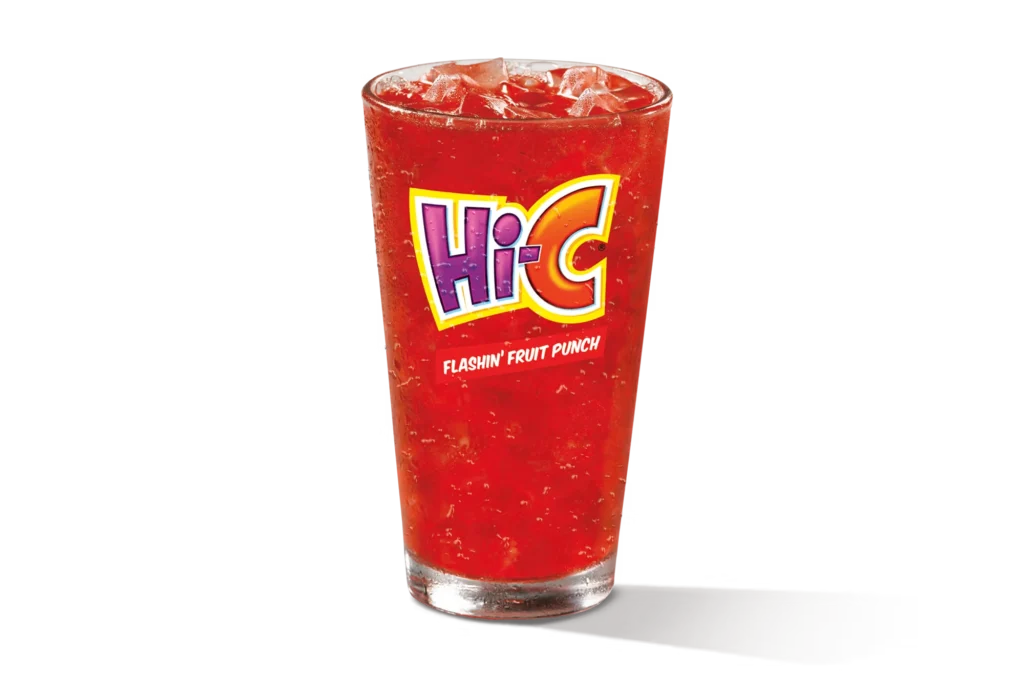 "Glass of Hi-C Flashin’ Fruit Punch with ice cubes, Hi-C logo on the glass, on a white background."